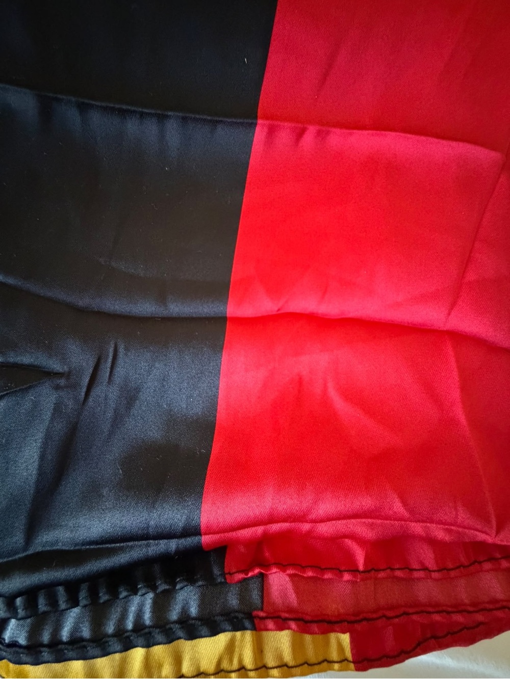 Elegant Lightweight black, red, and gold Wrap